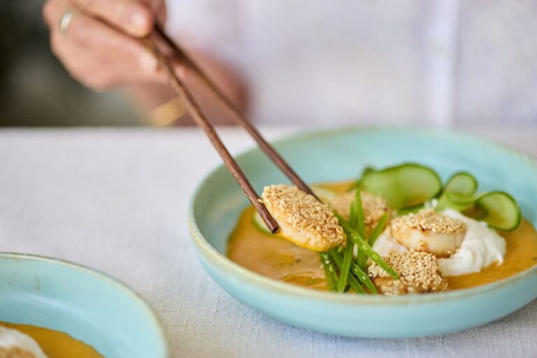 Sesame Seared Scallops Crème fraîche, Cucumber, Micro Herbs & Carrot Ginger Dressing